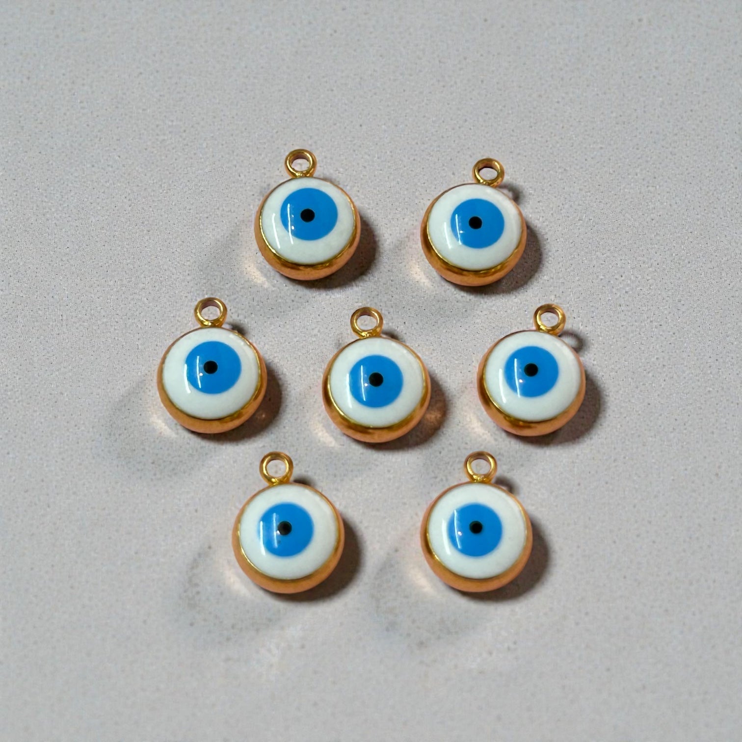 Dijes de ojo turco en acero